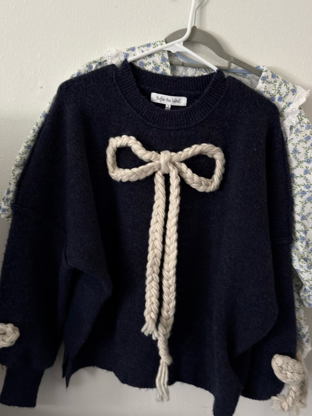 Navy Sweater with Cream Rope Bow